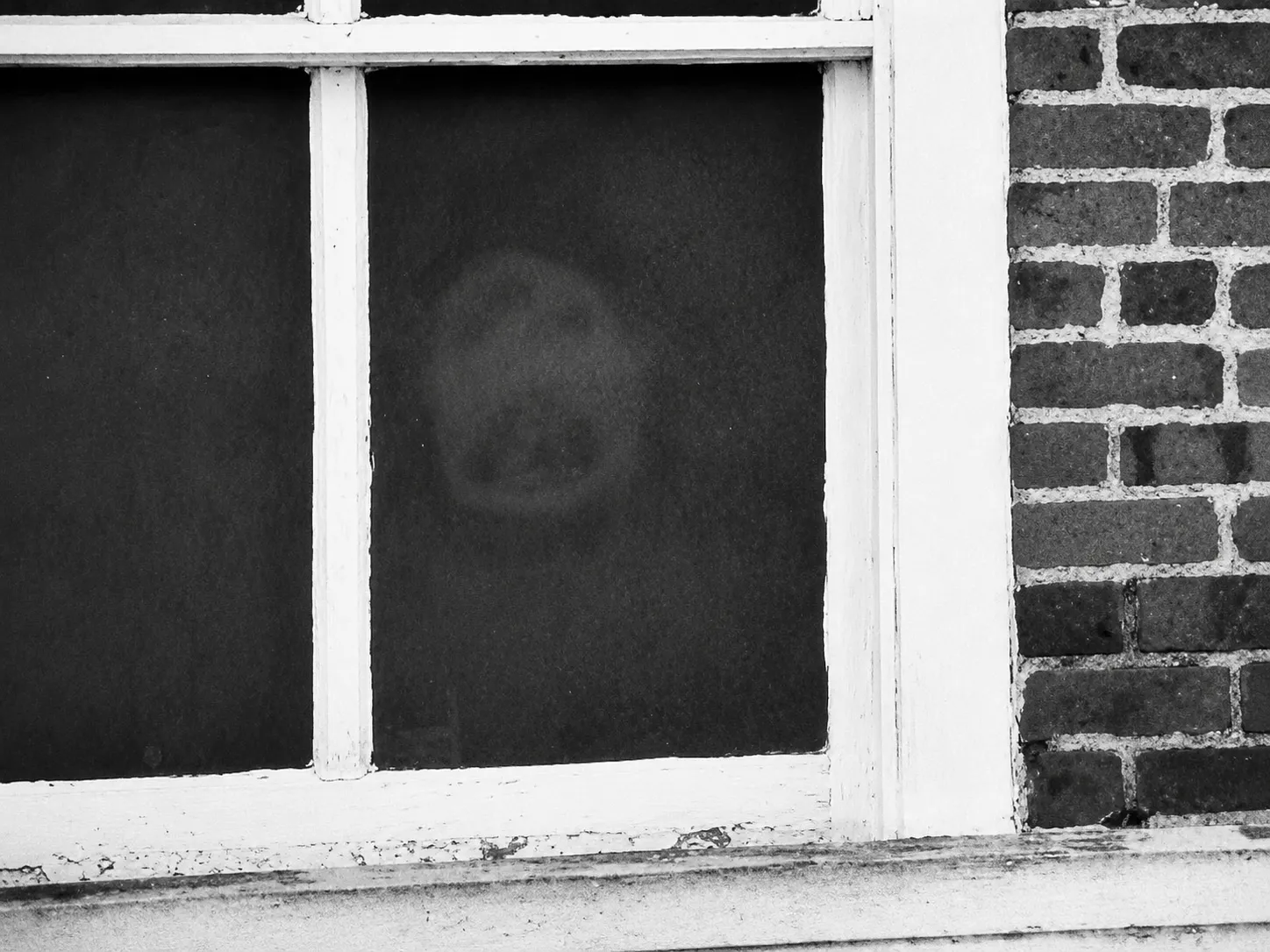 the Face in the Pickens County Courthouse Window